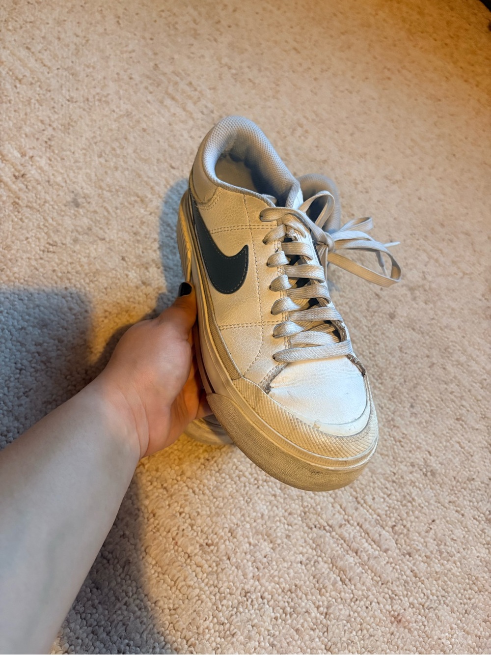 Nike White Low-Top Sneakers with Black Swoosh